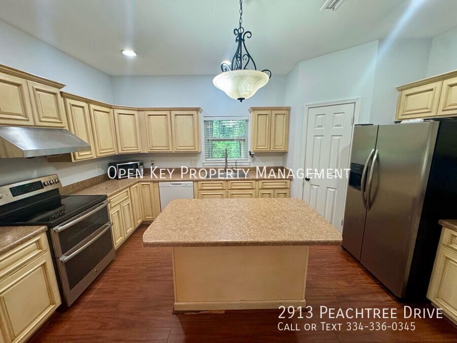 Beautiful and spacious 5 bedroom, 3 bath home for rent in Dothan, AL. Features open living area, beautiful wood floors, large backyard - this home is perfect for entertaining! property image