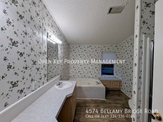 Spacious 4 bedroom, 2 bath mobile home for rent in Marianna, FL - includes lawncare, pets welcome, large back deck and open floor plan - perfect for entertaining. Don't miss out on this rental! property image