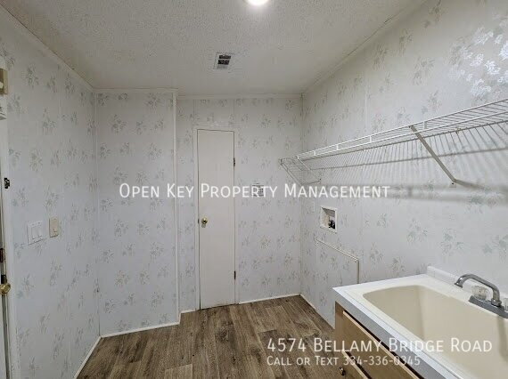 Spacious 4 bedroom, 2 bath mobile home for rent in Marianna, FL - includes lawncare, pets welcome, large back deck and open floor plan - perfect for entertaining. Don't miss out on this rental! property image