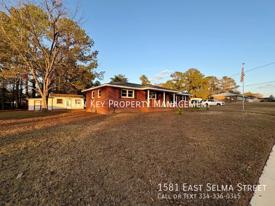 Spacious and beautiful 3 bedroom, 1.5 bath brick home for rent on a corner lot in Dothan, AL. Recently renovated with new flooring - includes a large yard, new appliances, and pets are welcome. property image