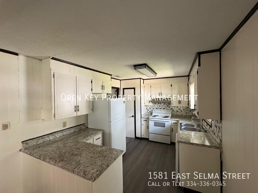 Spacious and beautiful 3 bedroom, 1.5 bath brick home for rent on a corner lot in Dothan, AL. Recently renovated with new flooring - includes a large yard, new appliances, and pets are welcome. property image