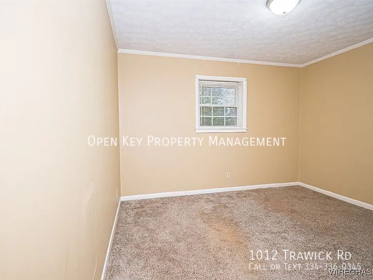 Beautiful 3BR/2BA home for rent in Dothan, AL. Sits of a spacious half-acre lot with den, fireplace, and sunroom. property image